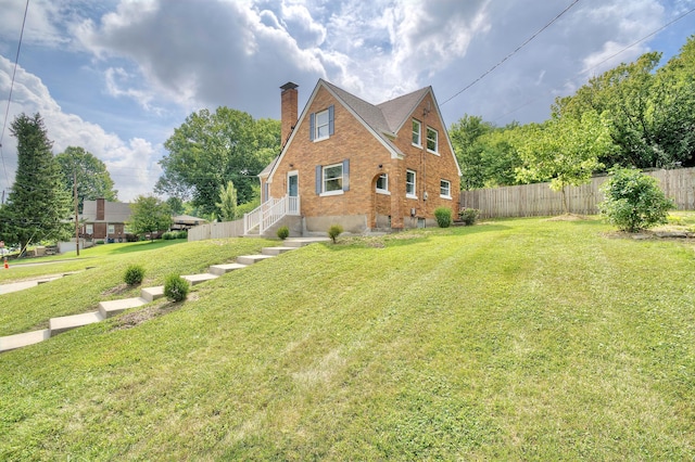 797 Highland Ave, Fort Wright, KY 41011 - view of home's exterior with brick siding and a chimney