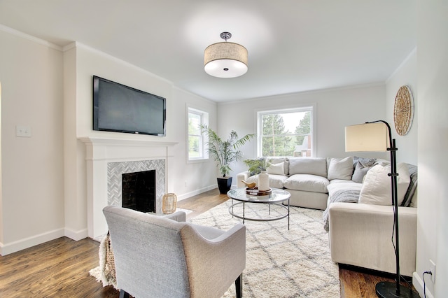 797 Highland Ave, Fort Wright, KY 41011 - living area featuring crown molding, wood finished floors, and a tile fireplace