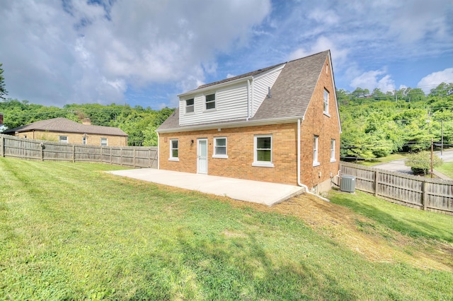 797 Highland Ave, Fort Wright, KY 41011 - rear view of house with a patio area, brick siding, a fenced backyard, and roof with shingles