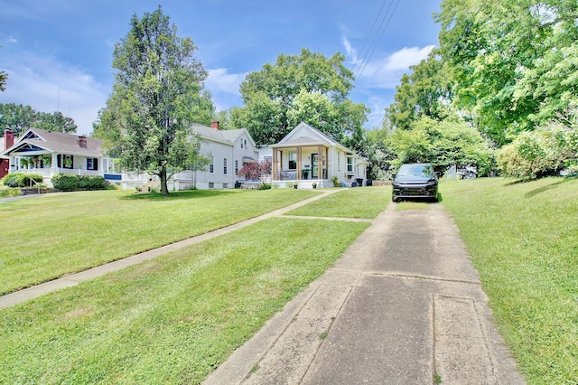 29 Crowell Ave, Fort Thomas, KY 41075 - bungalow-style home with concrete driveway, a front lawn, and covered porch
