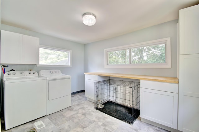 29 Crowell Ave, Fort Thomas, KY 41075 - laundry room featuring cabinet space, washing machine and clothes dryer, and healthy amount of natural light