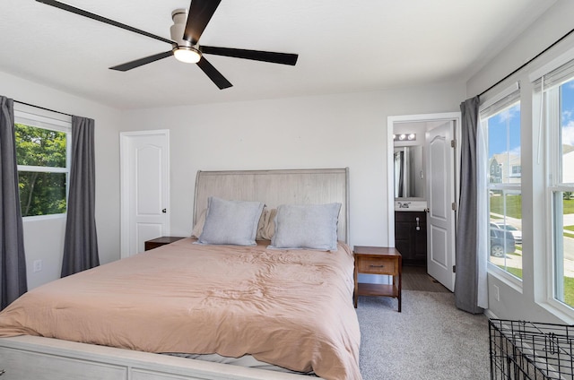 928 Darlington Creek Dr, Alexandria, KY 41001 - carpeted bedroom with multiple windows, ensuite bathroom, and a ceiling fan