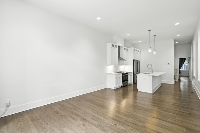 310 W Robbins St, Covington, KY 41011 - unfurnished living room featuring dark wood-type flooring and recessed lighting