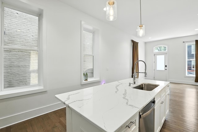 310 W Robbins St, Covington, KY 41011 - kitchen with dishwasher, dark wood-style flooring, white cabinetry, hanging light fixtures, and light stone countertops