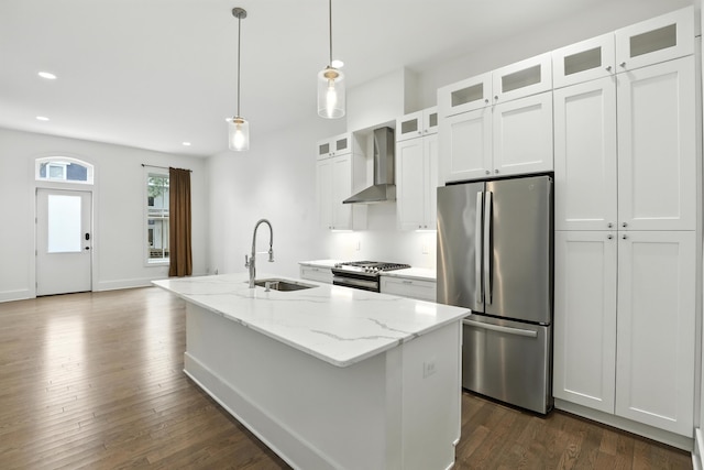 310 W Robbins St, Covington, KY 41011 - kitchen with stainless steel appliances, wall chimney exhaust hood, a kitchen island with sink, white cabinets, and recessed lighting