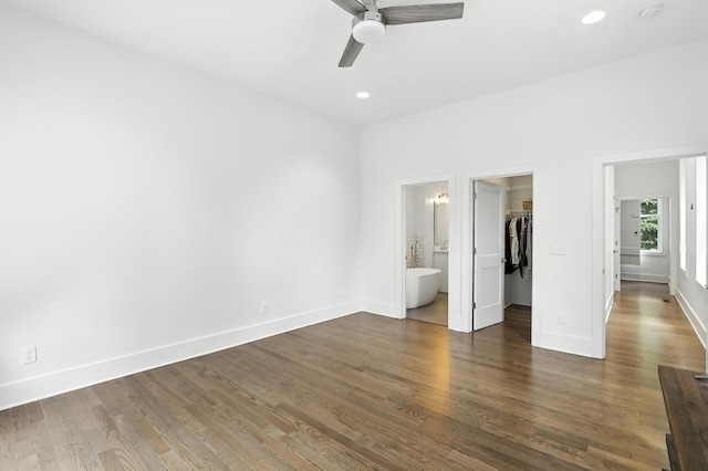 310 W Robbins St, Covington, KY 41011 - unfurnished bedroom featuring a spacious closet, dark wood finished floors, recessed lighting, connected bathroom, and ceiling fan