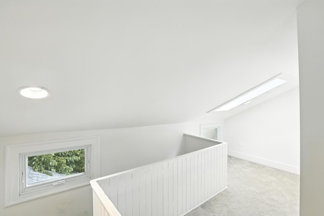 310 W Robbins St, Covington, KY 41011 - additional living space with a skylight, light colored carpet, and vaulted ceiling