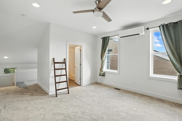 310 W Robbins St, Covington, KY 41011 - unfurnished bedroom with a wall unit AC, carpet floors, recessed lighting, and a ceiling fan