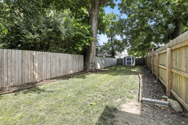 310 W Robbins St, Covington, KY 41011 - fenced backyard featuring a shed