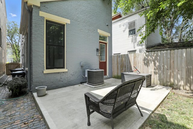 310 W Robbins St, Covington, KY 41011 - fenced backyard featuring a patio