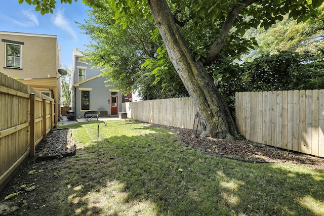 310 W Robbins St, Covington, KY 41011 - fenced backyard featuring a patio area