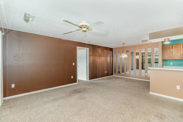 37 Rio Grande Cir Unit 5, Florence, KY 41042 - spare room with a textured ceiling, light colored carpet, and ceiling fan