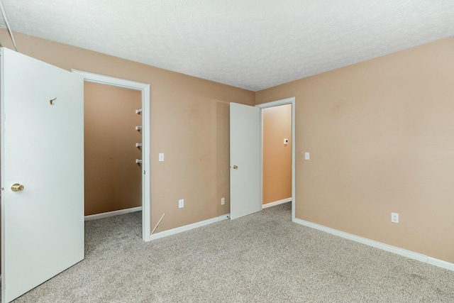 37 Rio Grande Cir Unit 5, Florence, KY 41042 - carpeted spare room featuring a textured ceiling