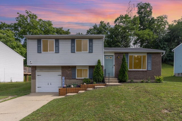 30 Valeside Dr, Covington, KY 41017 - tri-level home featuring an attached garage, brick siding, concrete driveway, and a front yard