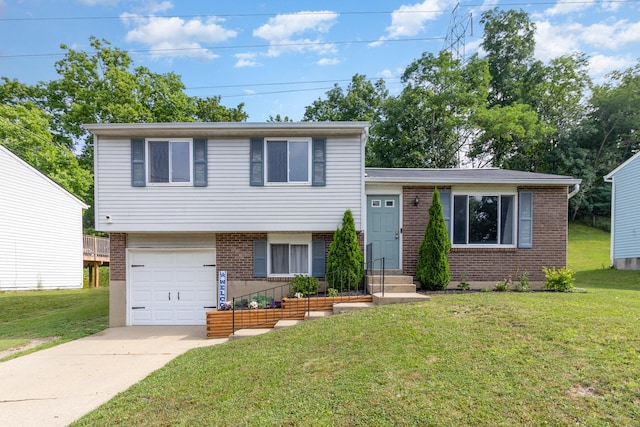 30 Valeside Dr, Covington, KY 41017 - split level home featuring brick siding, an attached garage, concrete driveway, and a front yard