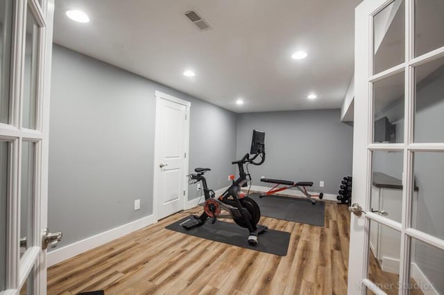 800 Buck Ct, Erlanger, KY 41018 - exercise area with wood finished floors, recessed lighting, and french doors