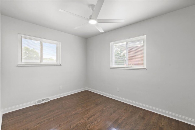 695 Maple Tree Ln, Erlanger, KY 41018 - empty room featuring healthy amount of natural light, dark wood-style flooring, and a ceiling fan