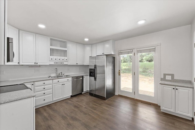 695 Maple Tree Ln, Erlanger, KY 41018 - kitchen with stainless steel appliances, open shelves, white cabinets, backsplash, and recessed lighting