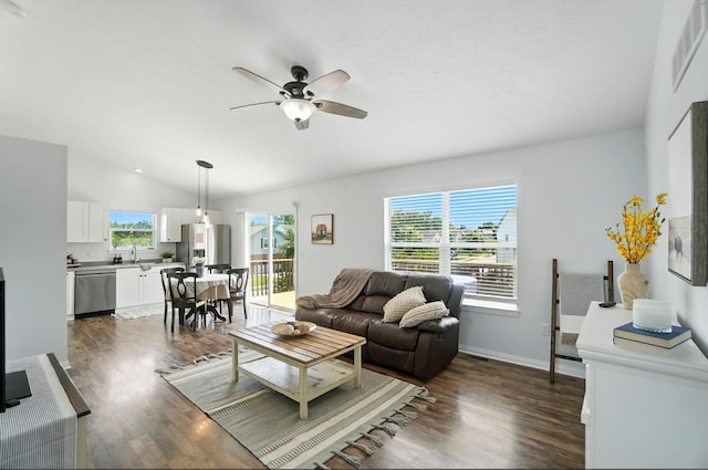 1625 Hogan Ln, Florence, KY 41042 - living room featuring ceiling fan, dark wood-style flooring, and vaulted ceiling
