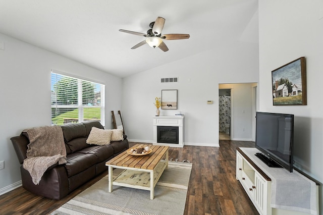 1625 Hogan Ln, Florence, KY 41042 - living area featuring a ceiling fan, dark wood finished floors, a glass covered fireplace, and high vaulted ceiling