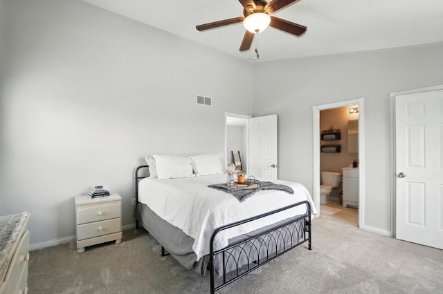 1625 Hogan Ln, Florence, KY 41042 - bedroom with carpet floors, vaulted ceiling, ceiling fan, and ensuite bathroom