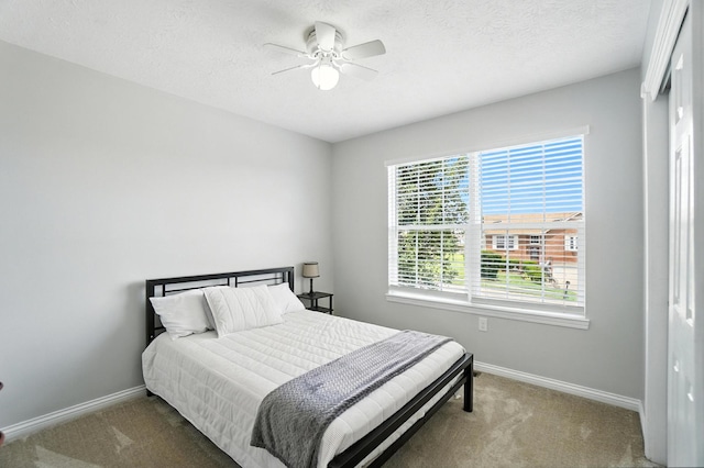 1625 Hogan Ln, Florence, KY 41042 - bedroom with carpet, a ceiling fan, and a textured ceiling