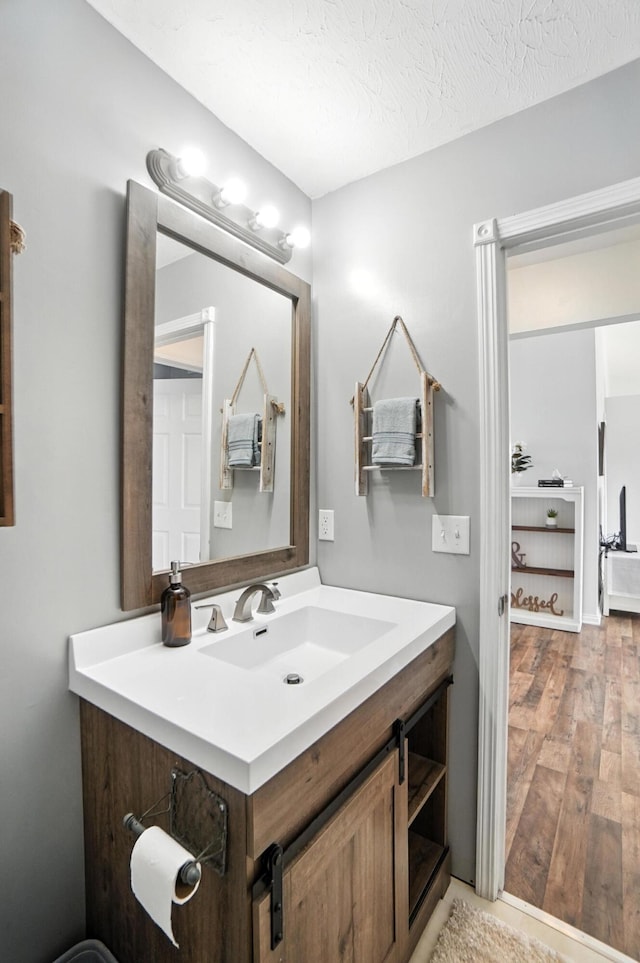 1625 Hogan Ln, Florence, KY 41042 - bathroom with vanity and wood finished floors