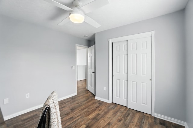 1625 Hogan Ln, Florence, KY 41042 - unfurnished bedroom with dark wood-type flooring, a closet, and ceiling fan