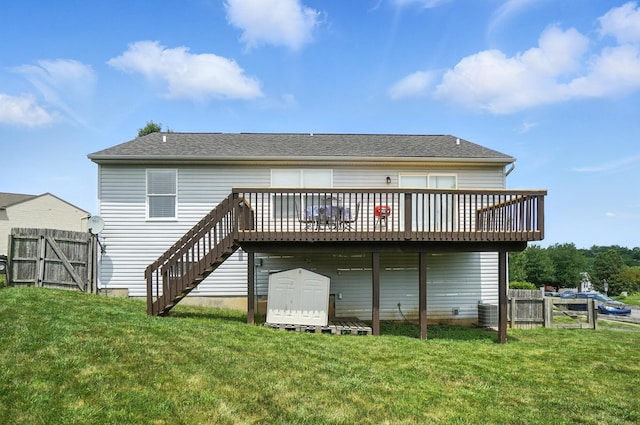 1625 Hogan Ln, Florence, KY 41042 - rear view of property featuring a deck, stairway, and a storage unit