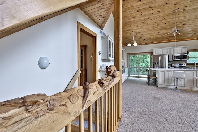 445 Elk Lake Resort Rd Unit 390, Owenton, KY 40359 - corridor featuring carpet, healthy amount of natural light, high vaulted ceiling, and wooden ceiling