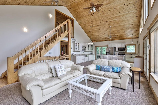 445 Elk Lake Resort Rd Unit 390, Owenton, KY 40359 - living area with a ceiling fan, high vaulted ceiling, stairs, wood ceiling, and light colored carpet