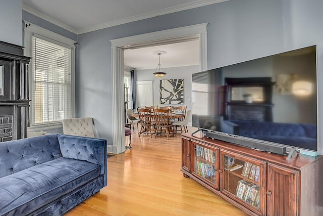 3141 Beech Ave, Covington, KY 41015 - living room featuring wood finished floors and ornamental molding