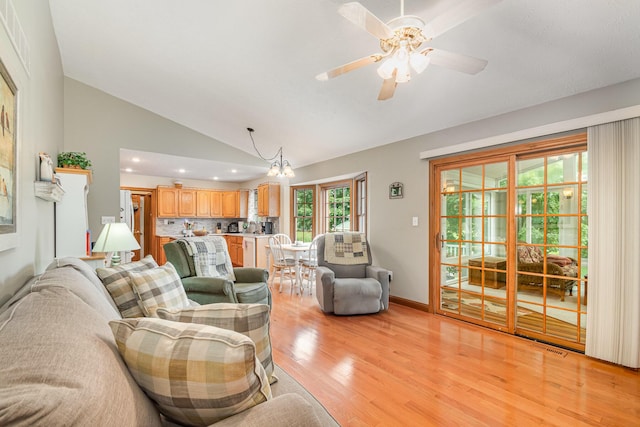 3950 Elliston Mount Zion Rd, Dry Ridge, KY 41035 - living room with lofted ceiling, light wood-type flooring, recessed lighting, a ceiling fan, and a chandelier