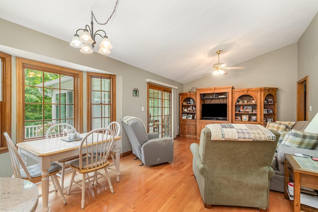 3950 Elliston Mount Zion Rd, Dry Ridge, KY 41035 - living area with vaulted ceiling, a chandelier, light wood finished floors, and a ceiling fan