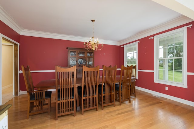 405 Alexander Rd, Crittenden, KY 41030 - dining area with a chandelier, wood finished floors, and crown molding