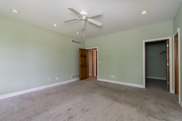 405 Alexander Rd, Crittenden, KY 41030 - unfurnished bedroom featuring carpet floors, a walk in closet, recessed lighting, and ceiling fan
