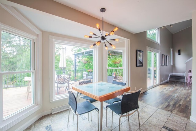 108 Regency Ct, Highland Heights, KY 41076 - dining room featuring a chandelier and stairway