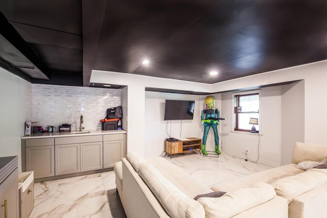 108 Regency Ct, Highland Heights, KY 41076 - living area with light marble finish floors, bar with sink, and recessed lighting