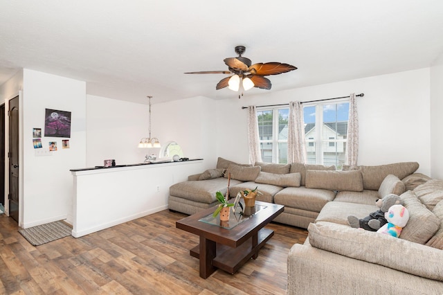 1539 Raintree Ct, Elsmere, KY 41018 - living room featuring wood finished floors, ceiling fan, and a chandelier