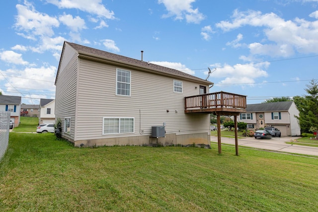 1539 Raintree Ct, Elsmere, KY 41018 - rear view of property with a lawn and a deck