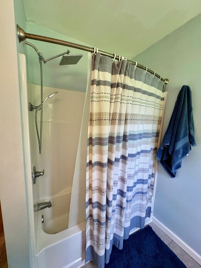 2543 Enid Ave, Crescent Springs, KY 41017 - bathroom featuring shower / tub combo with curtain and tile patterned flooring