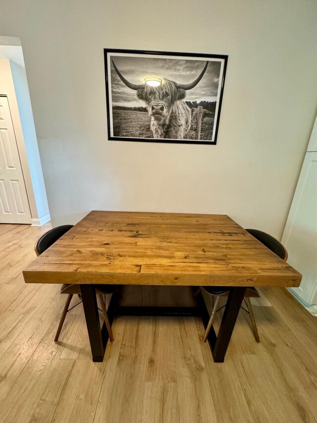 2543 Enid Ave, Crescent Springs, KY 41017 - dining space featuring wood finished floors and baseboards