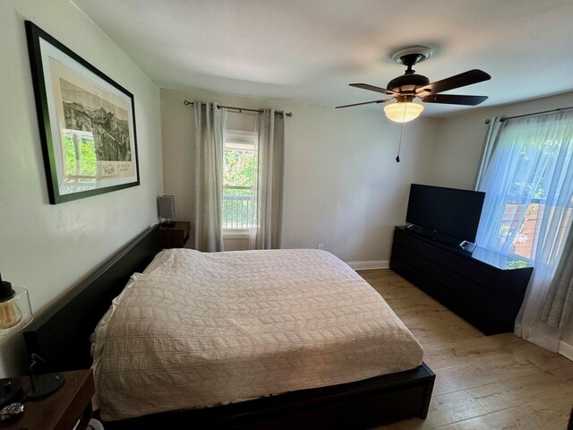2543 Enid Ave, Crescent Springs, KY 41017 - bedroom with light wood-style floors and ceiling fan