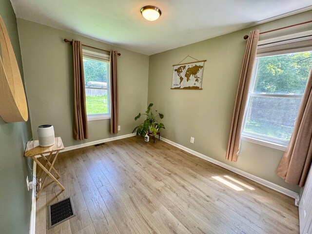 2543 Enid Ave, Crescent Springs, KY 41017 - unfurnished room with wood finished floors and baseboards