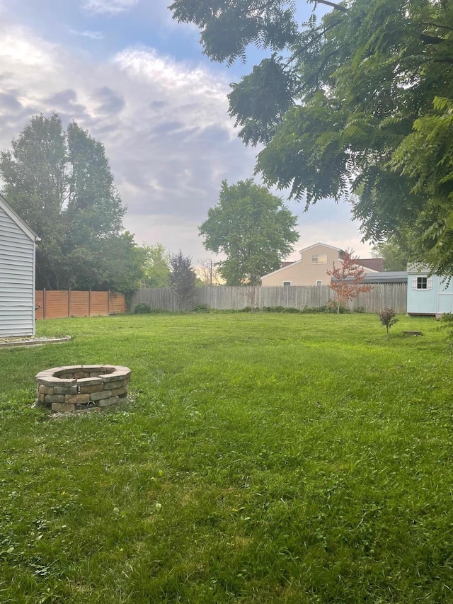 2543 Enid Ave, Crescent Springs, KY 41017 - view of yard featuring an outdoor fire pit