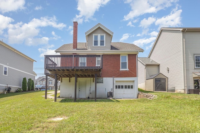 343 Rossford Ave, Fort Thomas, KY 41075 - rear view of house featuring a storage shed, an attached garage, a chimney, a yard, and a wooden deck