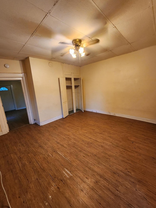 1539 Wheeler Aly, Covington, KY 41014 - unfurnished bedroom with wood finished floors, a ceiling fan, and a drop ceiling