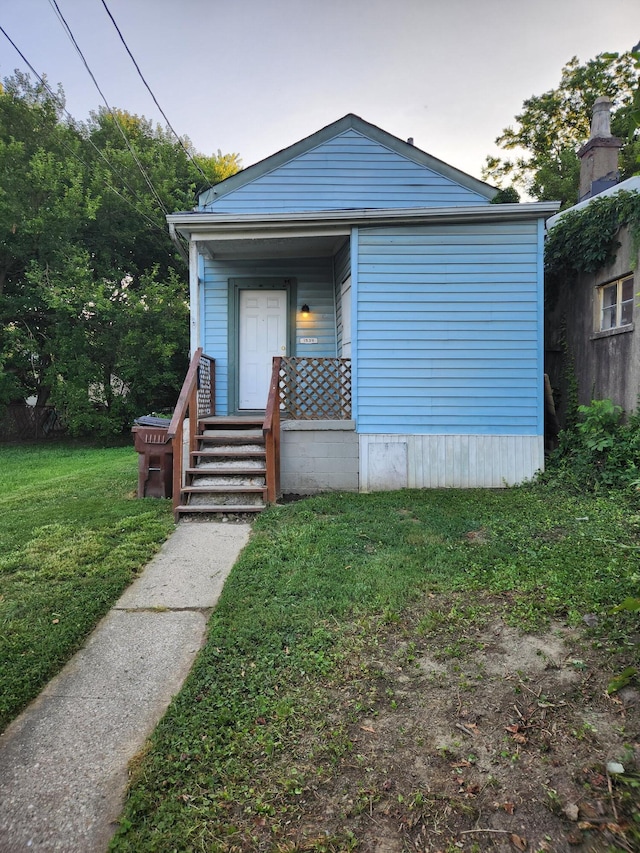 1539 Wheeler Aly, Covington, KY 41014 - view of front of home featuring a front lawn and covered porch