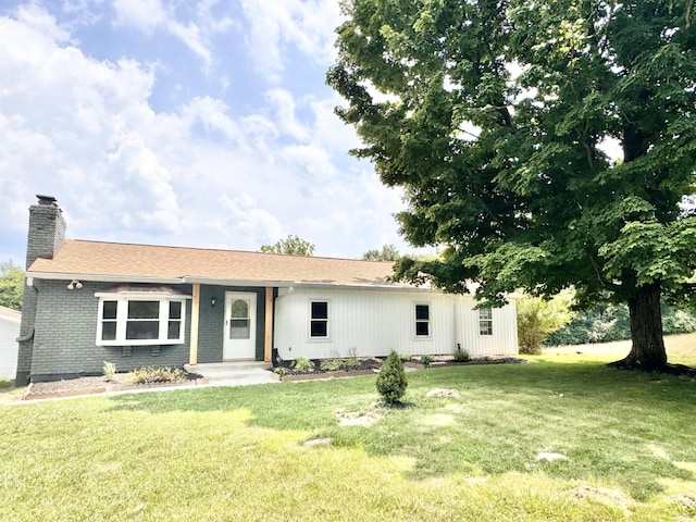 13165 Burns Rd, California, KY 41007 - ranch-style home with a front yard, a chimney, and a garage
