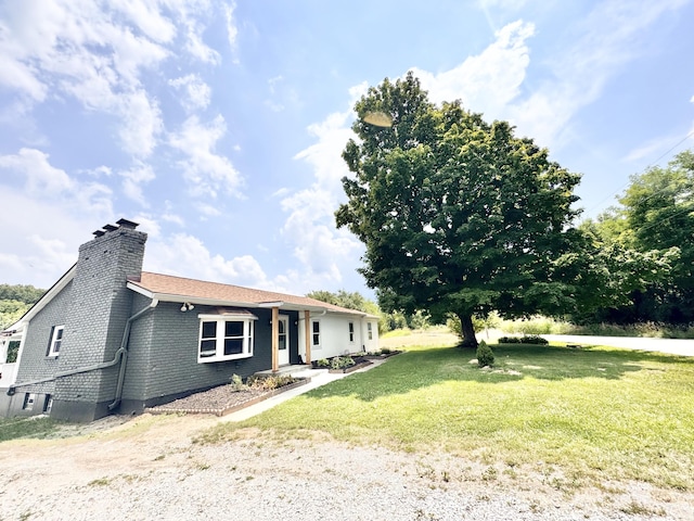 13165 Burns Rd, California, KY 41007 - view of front of property with a chimney and a front lawn